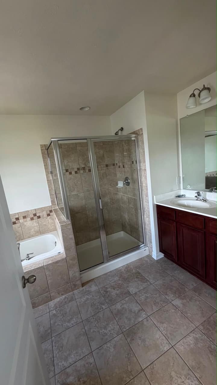 Spotless glass shower after professional cleaning